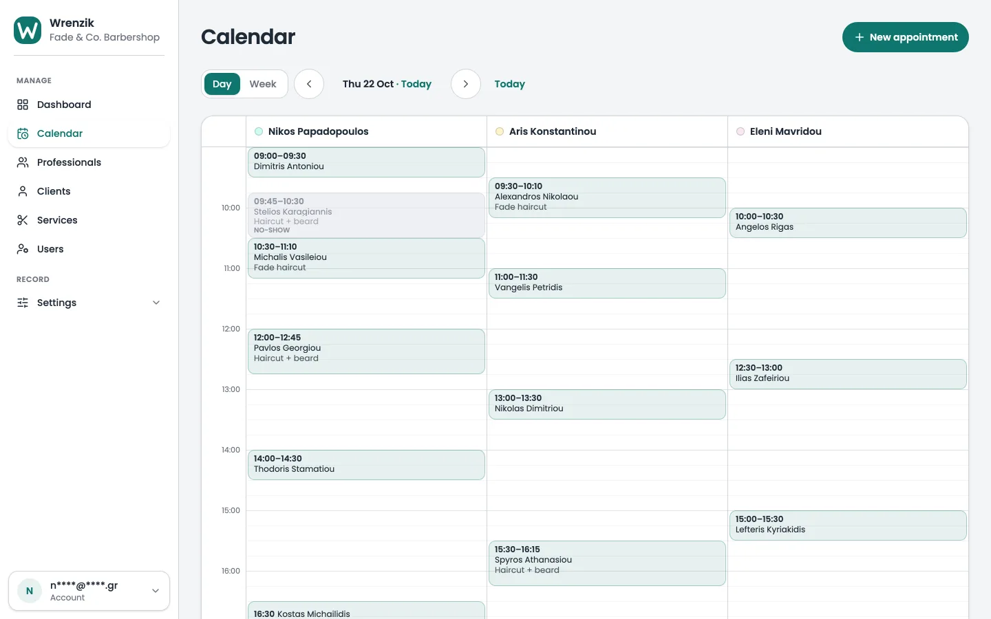 The appointment calendar on a laptop: one column per barber with the day’s bookings and free slots