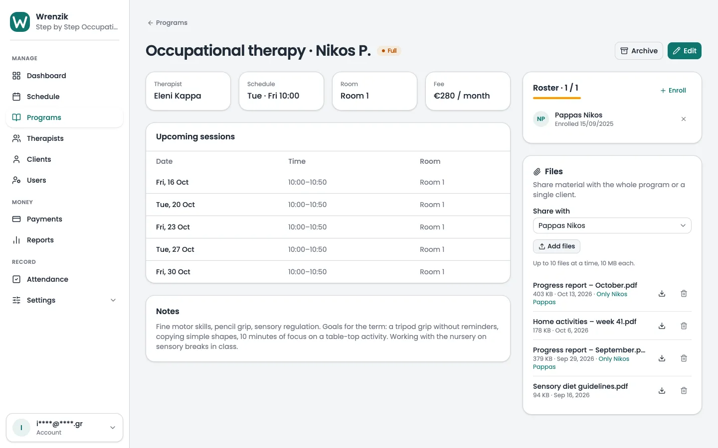 A therapy programme page on a laptop with a progress report just shared privately with one family
